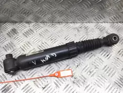 Амортизатор задний левый