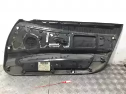 Обшивка двери передней левой (дверная карта)