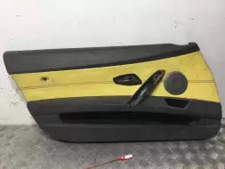 Обшивка двери передней левой (дверная карта)