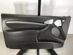 Обшивка двери передней левой (дверная карта)