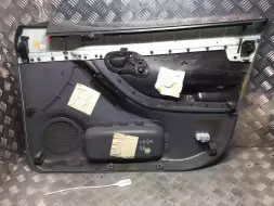 Обшивка двери передней левой (дверная карта)