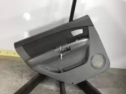 Обшивка двери передней левой (дверная карта)