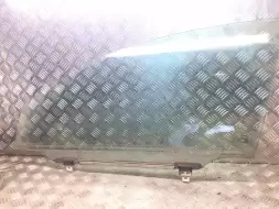Стекло двери передней левой