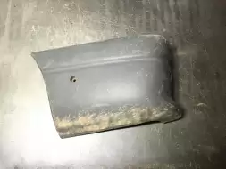 Клык бампера задний левый