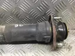 Амортизатор задний левый