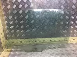 Стекло двери задней левой