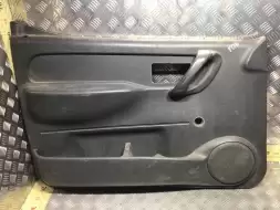 Обшивка двери передней левой (дверная карта)