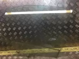 Стекло двери передней левой