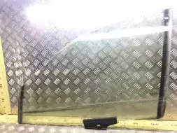 Стекло двери передней левой