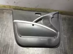 Обшивка двери передней левой (дверная карта)