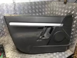 Обшивка двери передней левой (дверная карта)